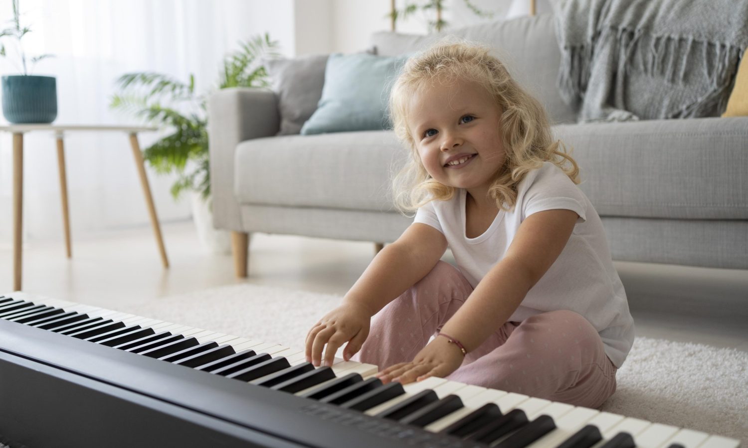 adorable-little-girl-learning-how-play-piano-home (1)