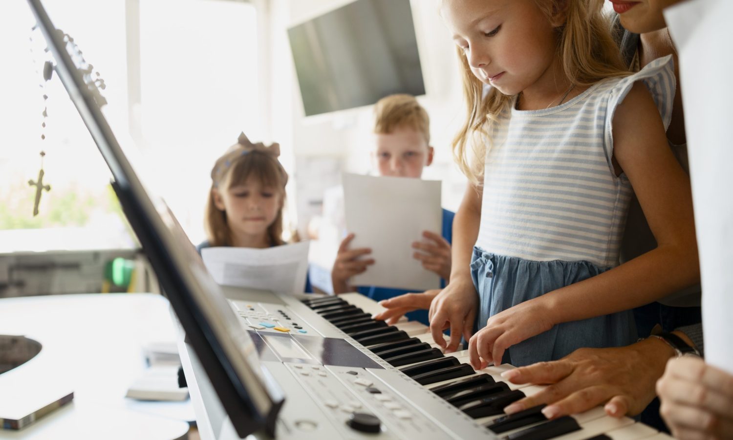 side-view-girl-learning-play-piano